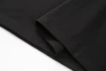 Black short-sleeve crew-neck T-shirt sleeve hem view