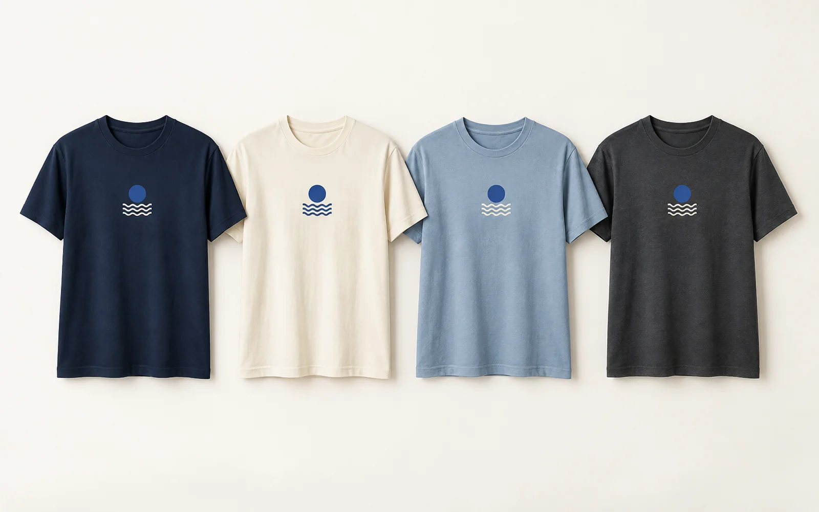 Four printed T-shirts in navy, cream, powder blue and charcoal