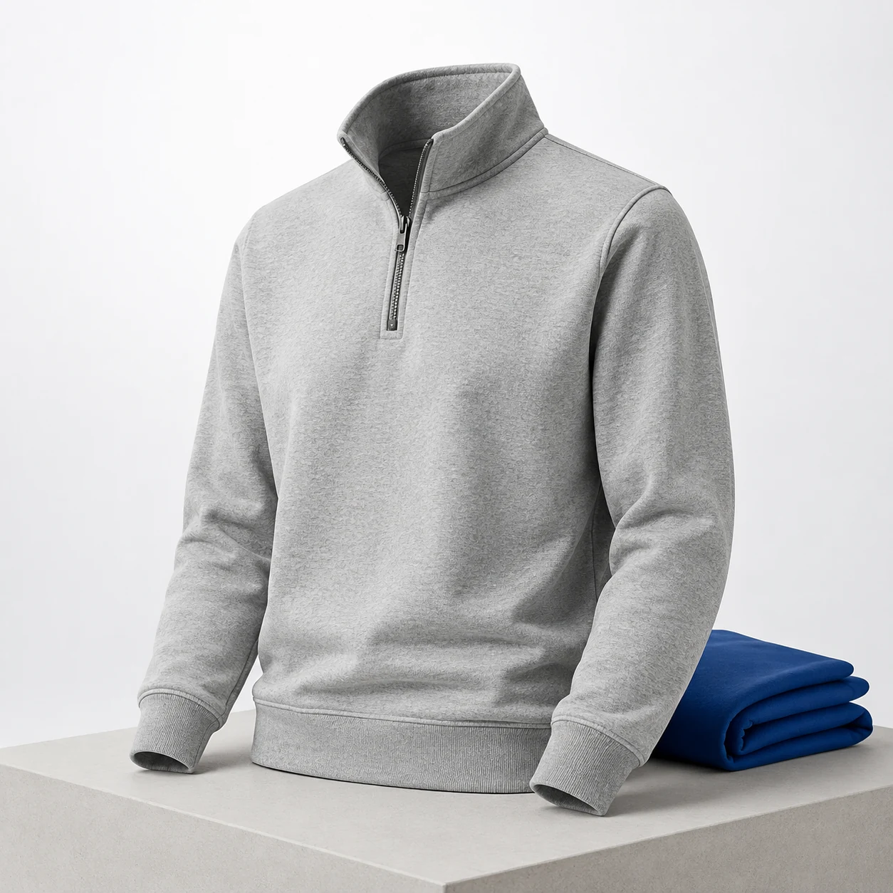 Heather gray quarter-zip sweatshirt ready for a group apparel project